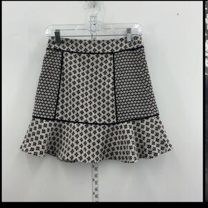 7
Ann Taylor LOFT Flared Hem Mixed Jacquard Flippy Skirt  Size 10 Black Color